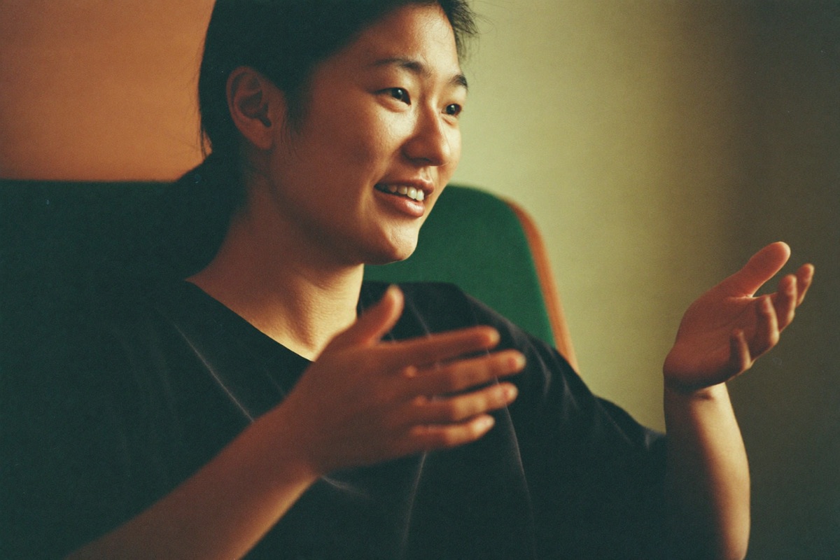 Patient speaking, hands gesturing gently